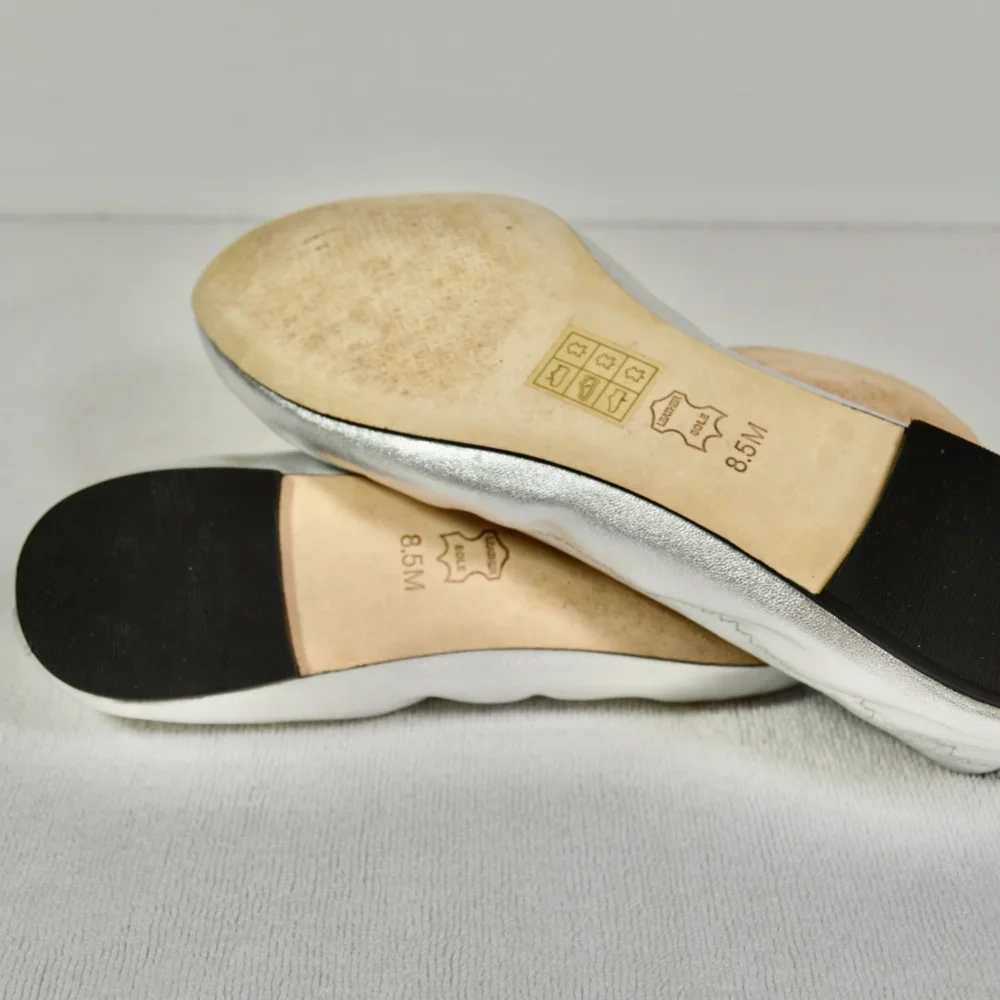 Tory Burch Women's Liana Round Toe Rhinestone Logo Metallic Leather Ball…
